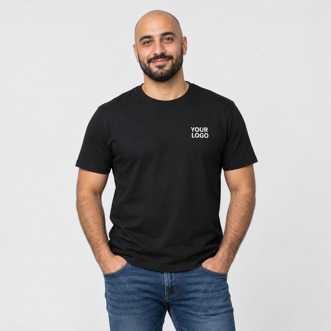 Model wearing a black T-shirt printed with YOUR LOGO