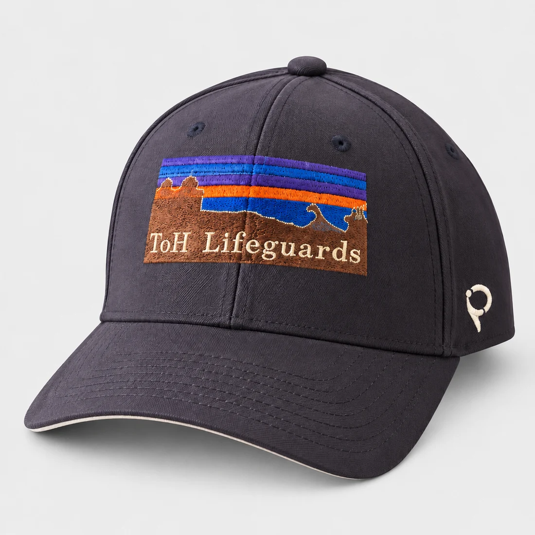 Dark cap with lifeguard embroidery